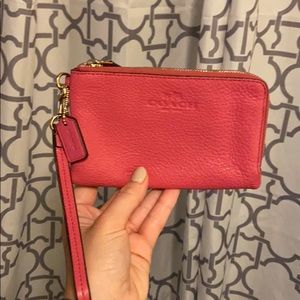 Pink wristlet coach